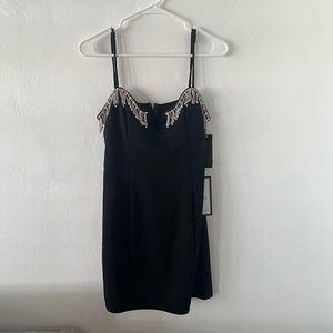 Mini black dress with crystal detail